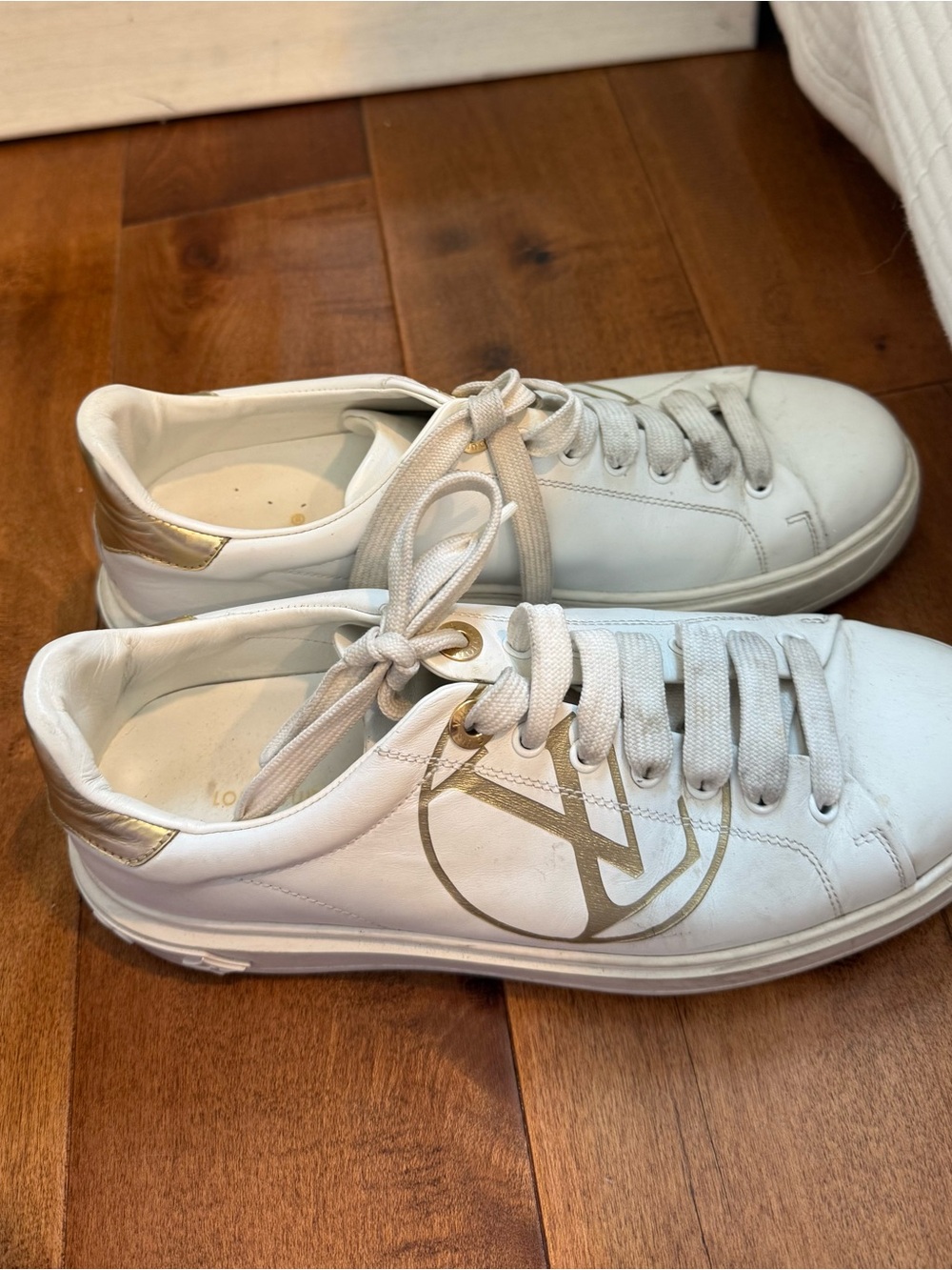 Louis Vuitton White Sneakers with Gold Accents